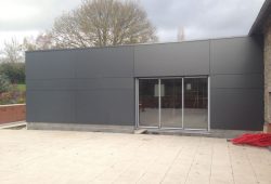 extension bois bardage trespa